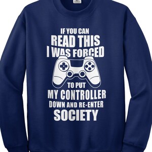 May include: A navy blue sweatshirt with a white graphic of a video game controller and the text "If you can read this I was forced to put my controller down and re-enter society."