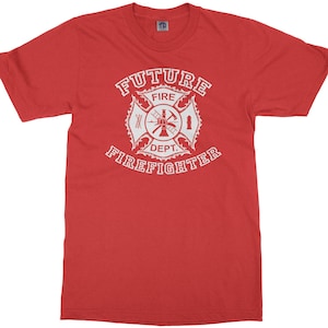 May include: Red t-shirt with a white graphic of a firefighter's helmet and crossed axes with the text "Future Firefighter"