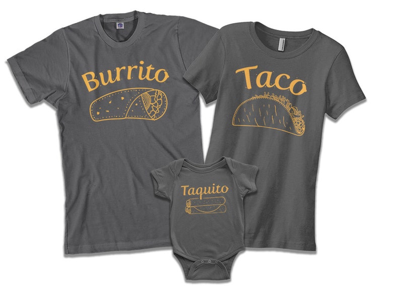 May include: A set of three gray t-shirts with a food theme. The adult shirts say "Burrito" and "Taco" with illustrations of the food. The baby shirt says "Taquito" with an illustration of a taquito.