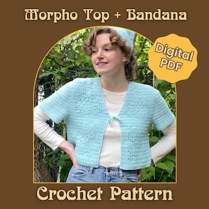 May include: A light blue crochet top with short sleeves and a matching bandana. The top has a delicate openwork design and is tied at the front. The image also includes the text "Morpho Top + Bandana" and "Crochet Pattern".
