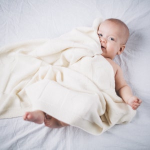 manta con muñeco para bebe