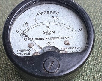 Vintage ex military amp meter from 1941. Black bakelite. 55mm diameter