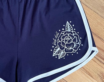 Women’s vintage style high waist navy blue jogger shorts with traditional tattoo rose