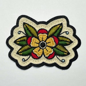 Handmade / hand embroidered off-white & black felt patch - small yellow and red flower with leaves - traditional tattoo flash