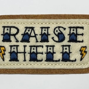 Handmade / hand embroidered tan & off white felt patch - 'Raise Hell' - vintage style - traditional tattoo flash lettering