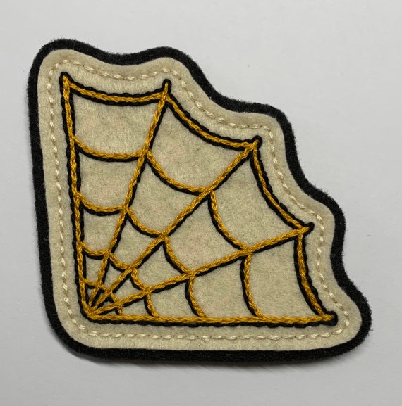 Large corner spider web patch