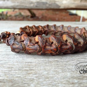 Authentische afrikanische Schlangenwirbel mit Lederarmband / Schlangenwirbelarmband / exotisches Armband / Atemberaubend für Frauen und Männer.