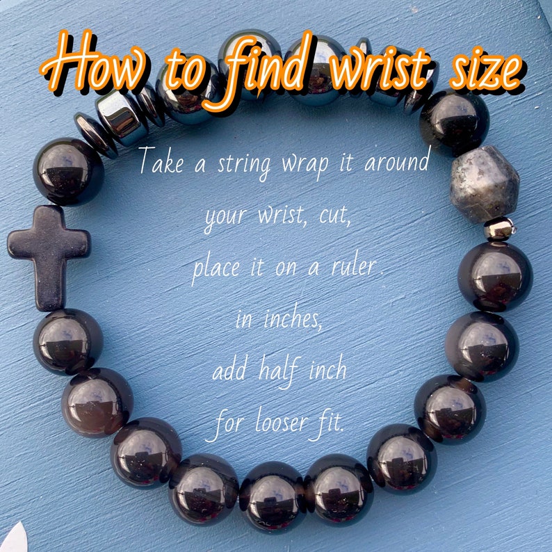May include: Black beaded bracelet with a cross charm. Instructions on how to measure your wrist for a proper fit are included: Take a string, wrap it around your wrist, cut it, place it on a ruler, add half an inch for a looser fit.