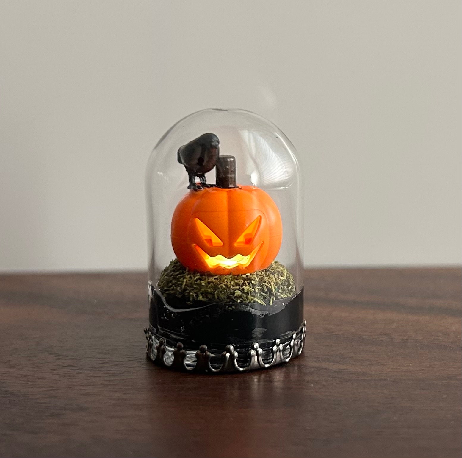 Glass Pumpkin Jack-o-Lanterns on Homemade Hay Bales