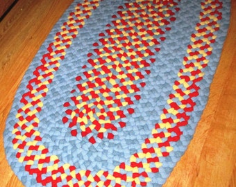 Area Oval Rug; Hand-Braided; Happy combo in bright blue, red, and yellow; Recycled Wool; 2' x 3' Oval; Handmade Rug; FREE SHIPPING in USA