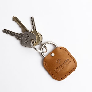 Portachiavi AirTag in pelle, portachiavi, supporto AirTag, custodia AirTag, copertura AirTag, pelle di qualità Premium, chiusura facile da aprire, personalizzata