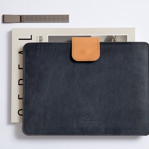 Leather MacBook Sleeve gives your MacBook Top protection.