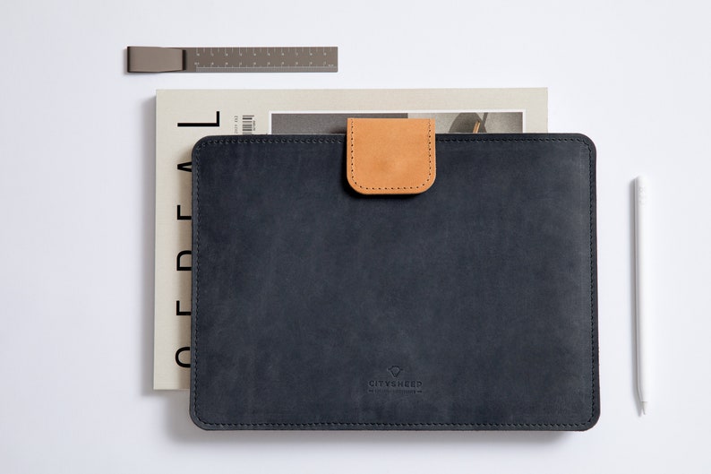 Leather MacBook Sleeve gives your MacBook Top protection.