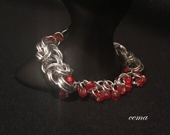 Bracelet.  Chunky and shiny red Czech glass beaded shaggy loop with wovern chainmail