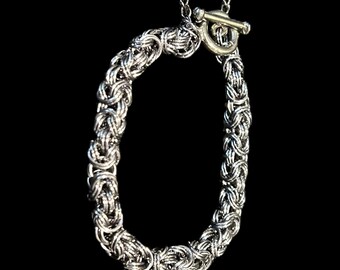 Black Ice Byzantine Bracelet with Moonstone & Leaf Charm – 7" Double‑Woven