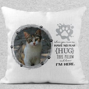 May include: White throw pillow with a grey circle containing a photo of a tabby cat. The text "When you miss me. HAVE NO FEAR {HUG} THIS PILLOW and know I'M HERE." is printed on the pillow.