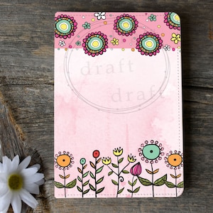 May include: A pink notebook cover with a floral design. The top border features a row of colorful, stylized flowers with a green, yellow, and pink color scheme. The bottom border features a row of green, yellow, and red flowers with black stems. The text "draft" is printed in a circle in the center of the cover.