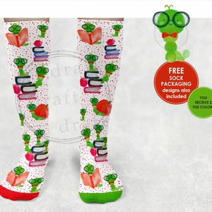 May include: A pair of white knee-high socks with a red and green pattern of bookworms reading books and apples. The socks have red and green toe tips. The socks are on a white background with a red circle that says "FREE SOCK PACKAGING designs also included" and a smaller green circle that says "YOU RECEIVE 2 TOE COLORS".