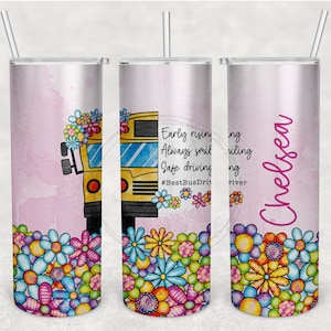 May include: A floral-themed tumbler with a school bus design. The tumbler features a pink watercolor background, colorful flowers, and text that reads "Early rising, Always smiling, Safe driving." The name "Chelsea" is also displayed.