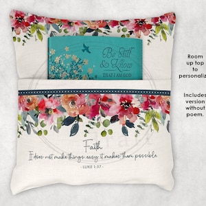 May include: A white pillow with a floral design and a pocket on the front. The pocket contains a teal blue journal with the words "Be Still & Know That I Am God" printed on the front. The pillow also has the words "Faith" and "It does not make things easy it makes them possible - LUKE 1:37 -" printed on the front.