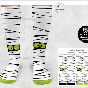 May include: A pair of white knee-high socks with black stripes and green eyes. The socks are designed to look like a mummy. The text "4 designs" and "FREE SOCK PACKAGING designs also included" is visible in the image.