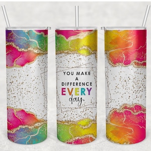 May include: Three colorful stainless steel tumblers with a white background and gold glitter. The middle tumbler has the text "You make a difference every day." in a colorful font.