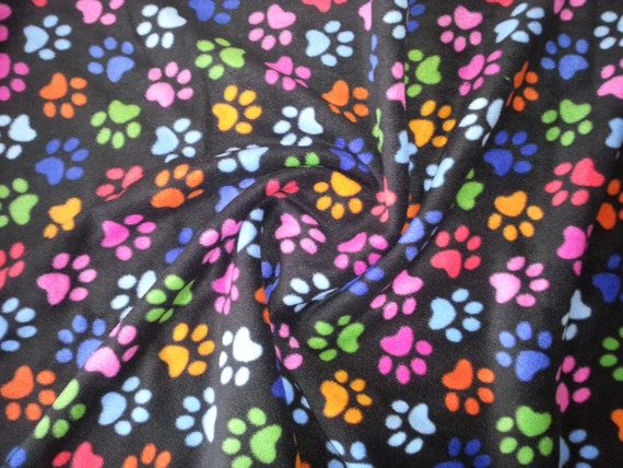 Pfoten Sie Druck auf schwarz Polar-Fleece-Stoff Meter/halb