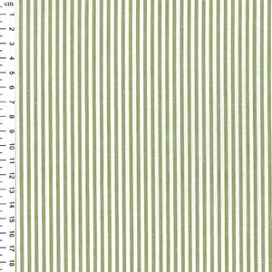 May include: A close-up of a white fabric with thin, vertical green stripes. The fabric is measured in centimetres.