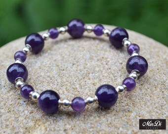 Handmade stretch bracelet with Sterling Silver & Amethyst.