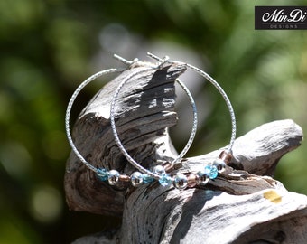 Earrings, pair of handmade earrings with sterling silver & glass beads.
