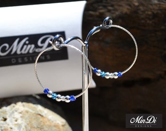 Earrings, pair of handmade earrings with sterling silver & glass beads.