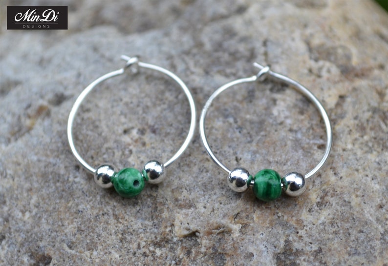pair of handmade earrings with sterling silver /& malachite. Earrings