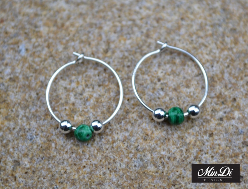 pair of handmade earrings with sterling silver /& malachite. Earrings