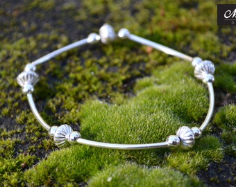 Handmade stretch bracelet with Genuine Sterling Silver.