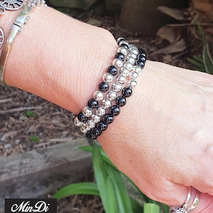 Handgemaakte stretch armbanden met sterling zilver &zwart onyx – 6mm
