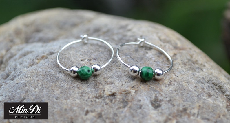 pair of handmade earrings with sterling silver /& malachite. Earrings