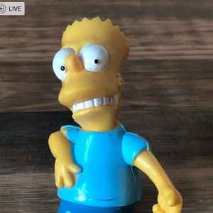 Bart Simpson-Bart Simpson Beeldje-Air Gitaar spelen-The Simpsons-Made in China-1990-Kous Stuffer-Bart Air Gitaar-Bart Simpson Knielen