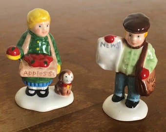 Dept 56-Snow Village-Girl Selling Apples and News Boy-Set of 2-1988-Retired in 1990-Ceramic-with original box-Original Snow Village