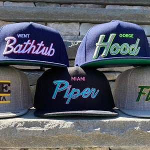 Notable Numbers Script Hat ; 7 logos