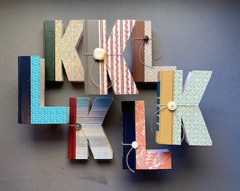 BOOK LETTER K or L Reader's Digest  cut book  • recycled books • up-cycled books • teacher gift • book ends • library • house warming gift