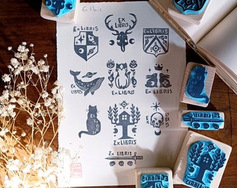 Various handcarved Ex Libris rubber stamps, mounted on wood. Price for each stamp