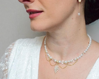 ROMY - a glamorous Bridgerton-style wedding necklace with mother-of-pearl and crystal beads, cascading chains, and a rhinestone pendant