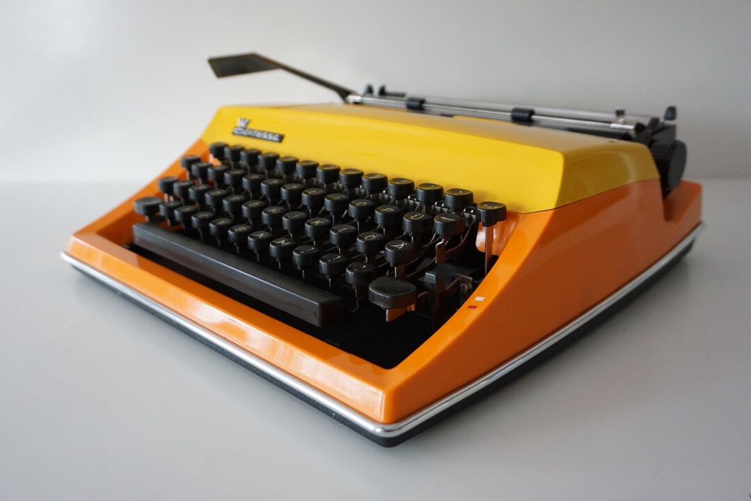 Vintage CURSIVE (italic - Script) Retro 1977 Orange & Yellow Triumph ...
