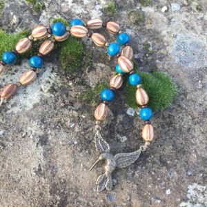 Collier ethnique en graines Santa Barbara et acai turquoise colibri en métal couleur bronze image 4
