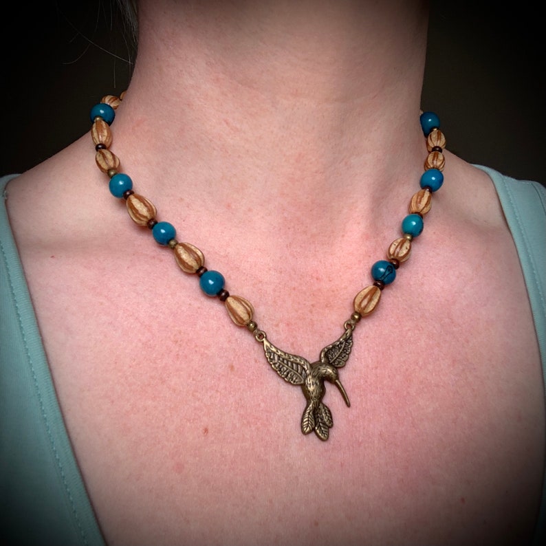 Collier ethnique en graines Santa Barbara et acai turquoise colibri en métal couleur bronze image 5