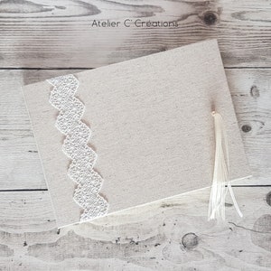 Livre d'or mariage { Rêve } toile de lin coloris naturel, dentelle de tulle brodé et pompon d'organza