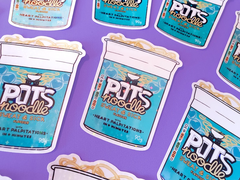 May include: A set of six colorful stickers featuring a cartoon illustration of a cup of instant noodles with the text "POTS noodle" and the slogan "Sweat & Sick Flavor". The stickers have a glittery finish and include the text "Heart palpitations in 4 minutes 90g".