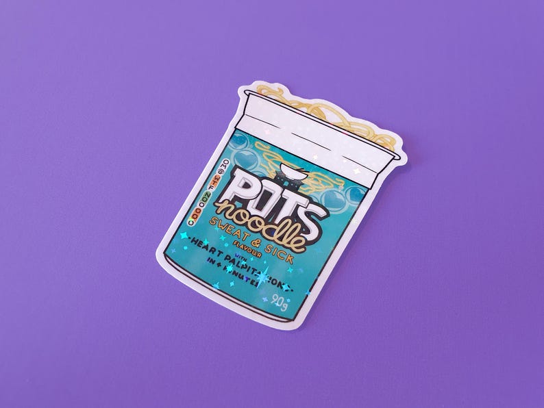 May include: A sticker of a blue and white instant noodle cup with the text "POTS noodle SWEAT & SICK FLAVOUR with HEART PALPITATIONS in 4 MINUTES 90g" printed on it.