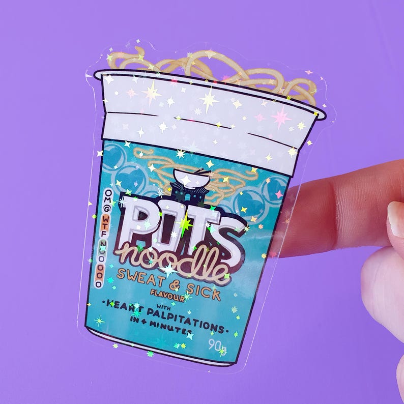 May include: A clear sticker with a glittery design of a blue and white instant noodle cup. The cup has the text "POTS noodle SWEAT & SICK FLAVOUR WITH &bull;HEART PALPITATIONS- IN + MINUTES 90g" printed on it.