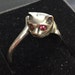 Vintage Adjustable Silver Cat wraparound ring with red coloured eyes currently size O